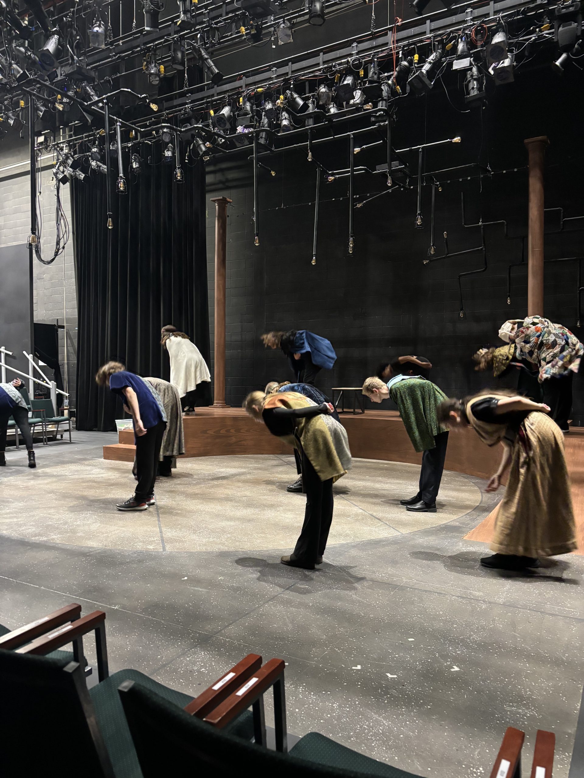 Students taking a bow in costume