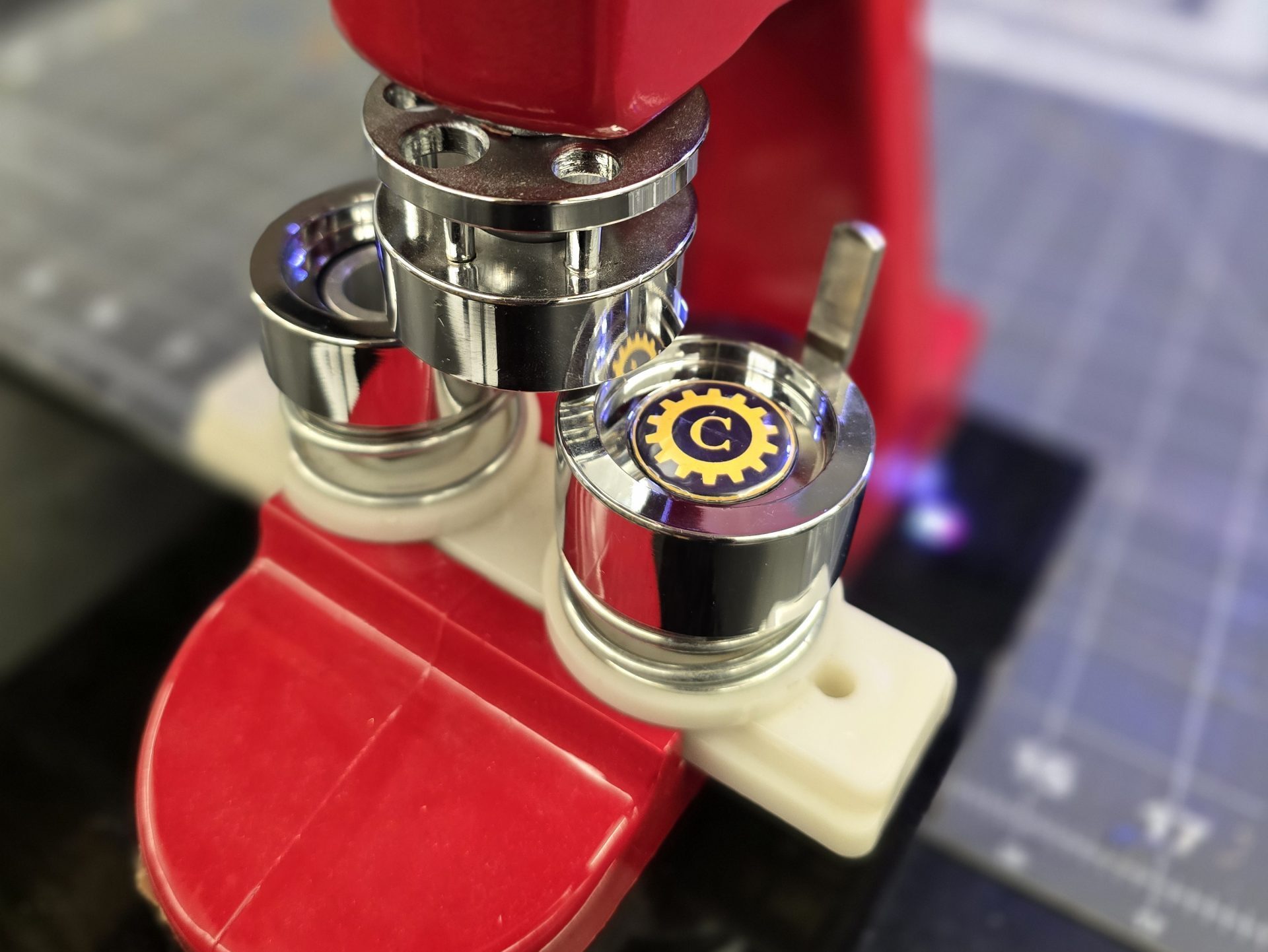 a button maker with a fresh new button