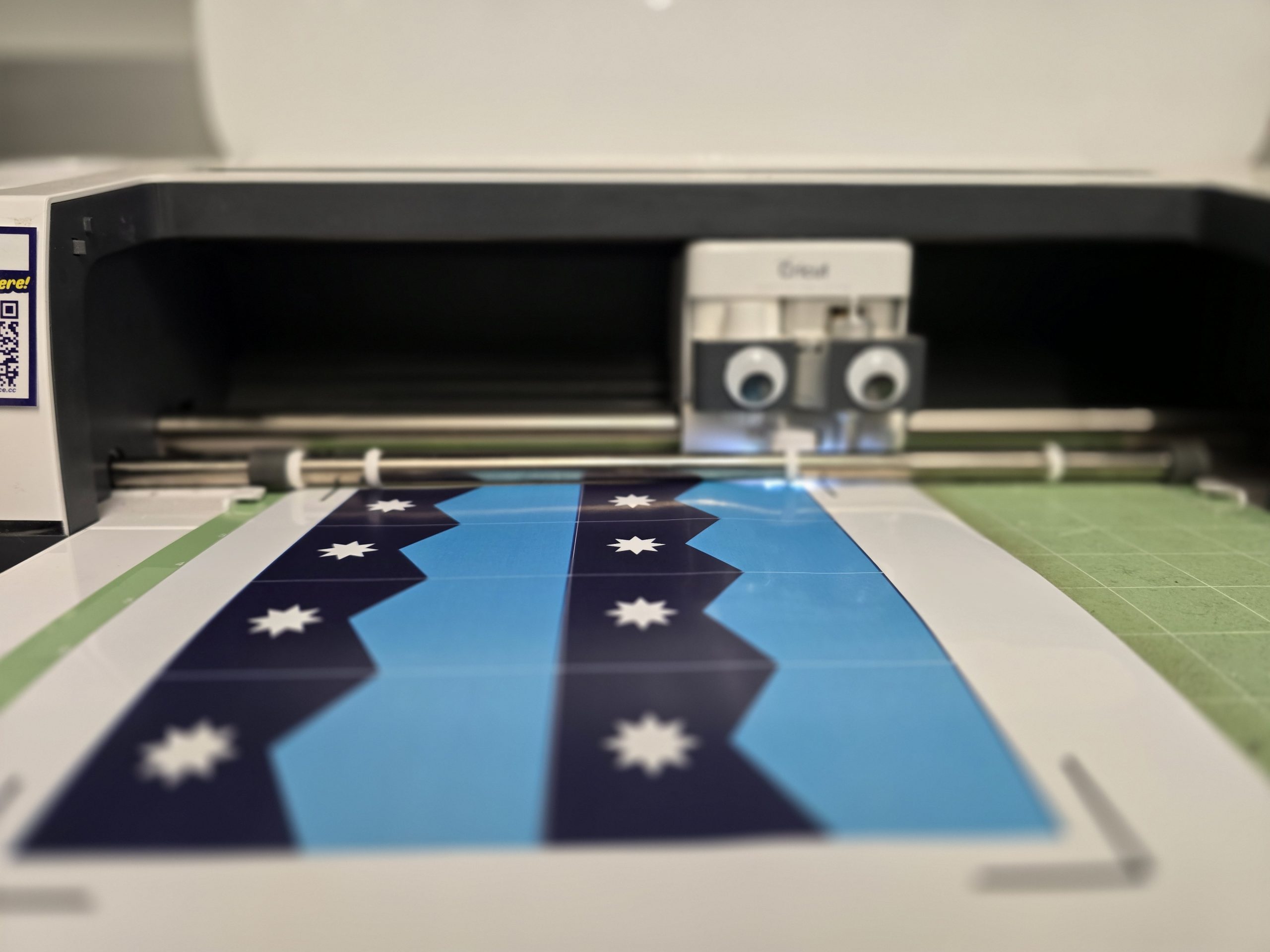 the sticker cutter cutting out stickers