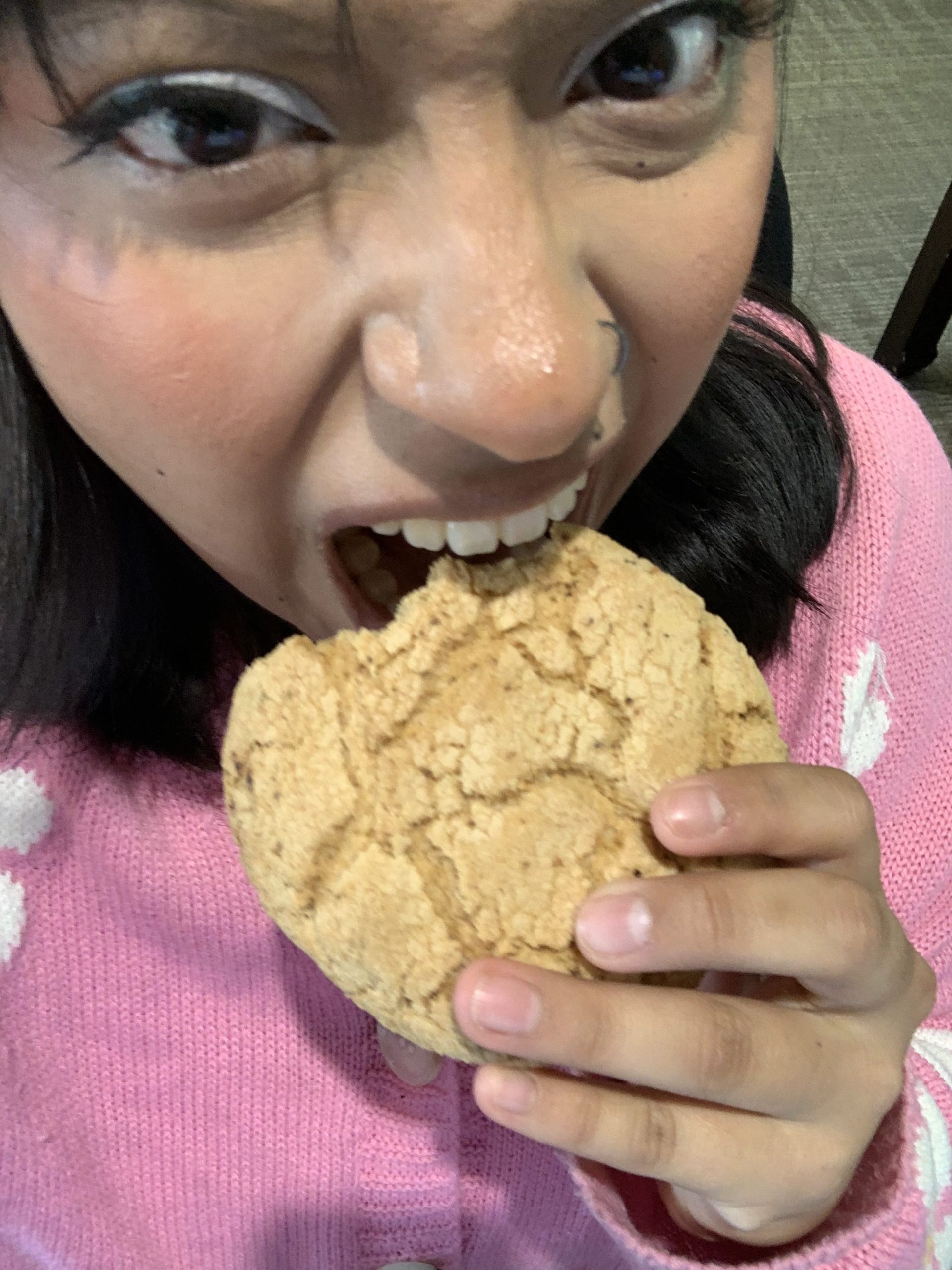 a student eating a cookie