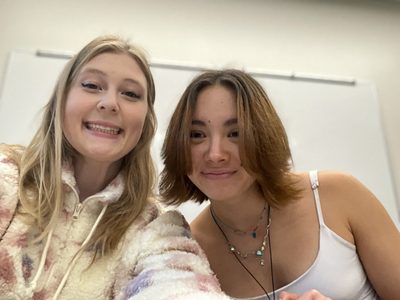 Two girls smiling at the camera