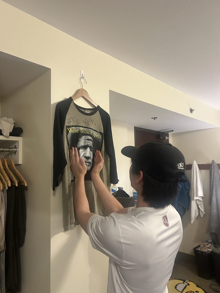 Stefan looking longingly at Willie Nelson shirt