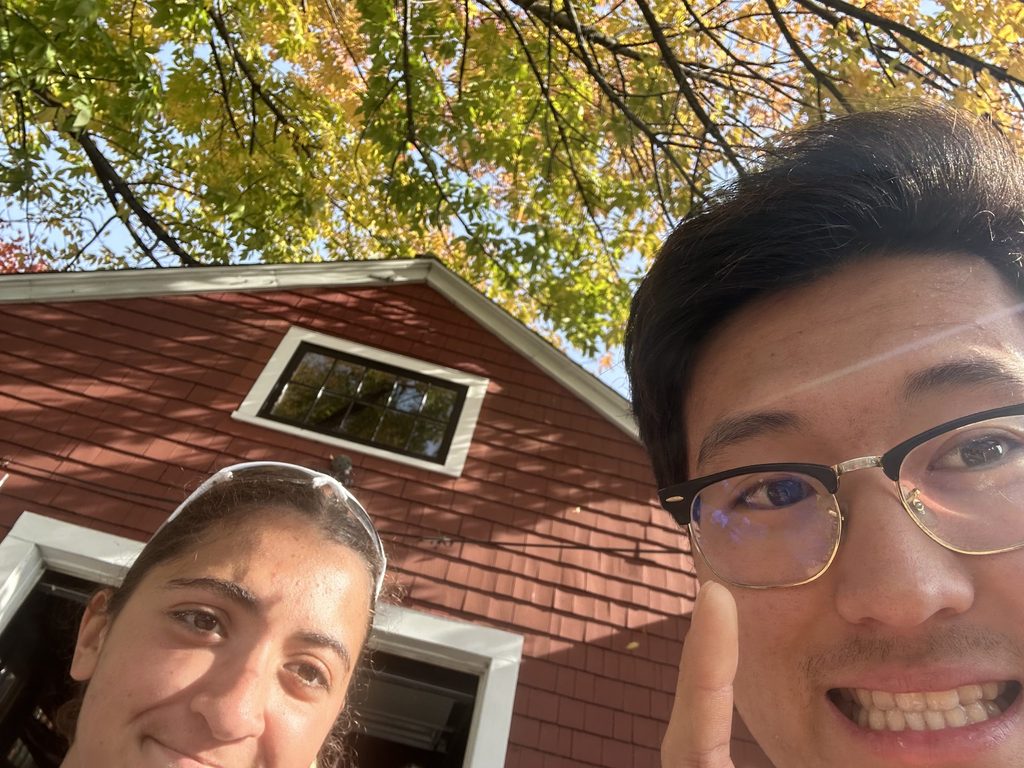 A man and his friend posing for a selfie