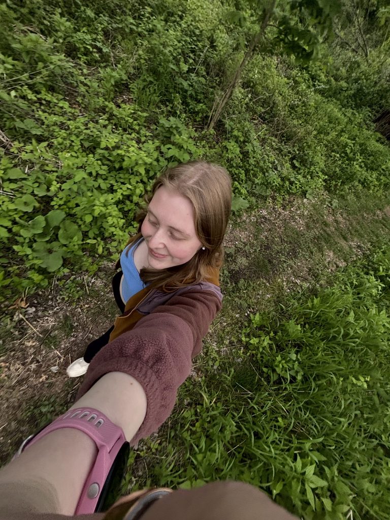 A girl walking in the arb