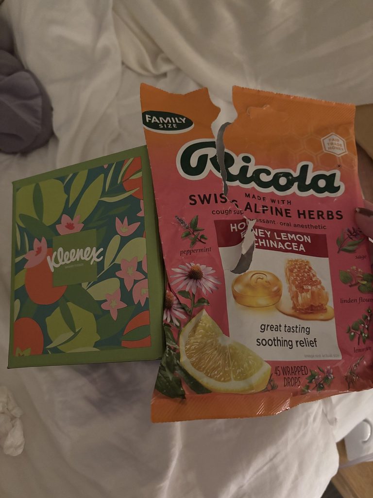 A bag of cough drop and a box of tissues