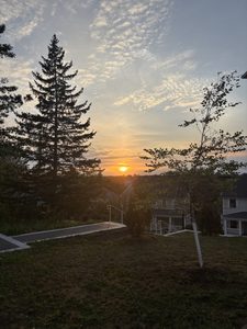 a sunset near the townhouses