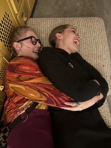 two girls laughing