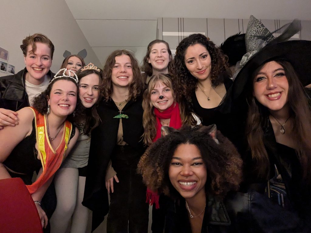 A group of costumed students