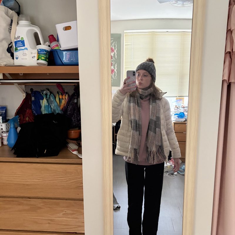 a girl in winter clothes