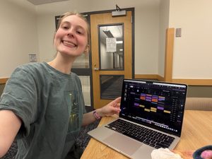 A girl smiling in front of her google calender