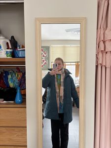 a girl wearing lots of layers