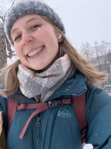 A girl smiling in the snow