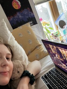 a girl watching a show