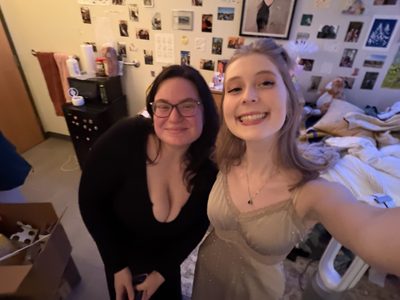 two girls smiling at the camera