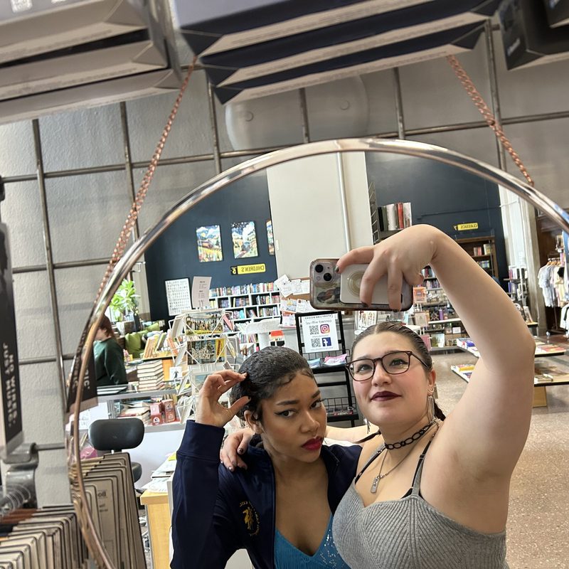 Mirror selfie, fixing hair