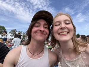 two students smiling at the camera