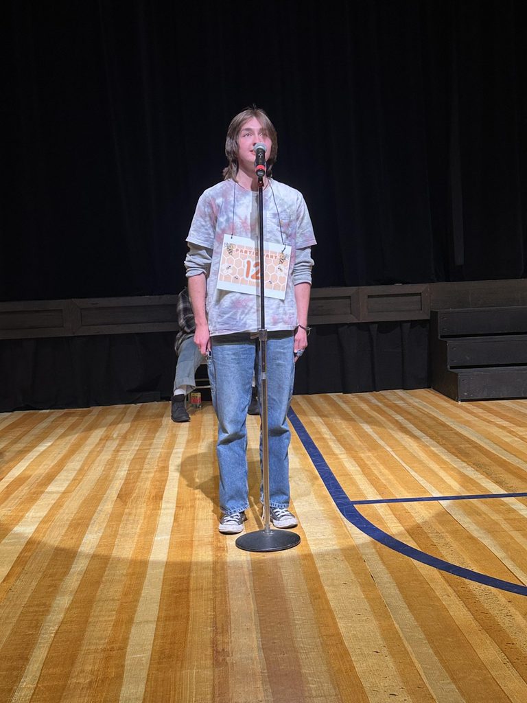 Spellling Bee Carleton musical student on stage