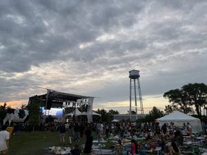 students at Sproncert 2026 with the watertower in the background