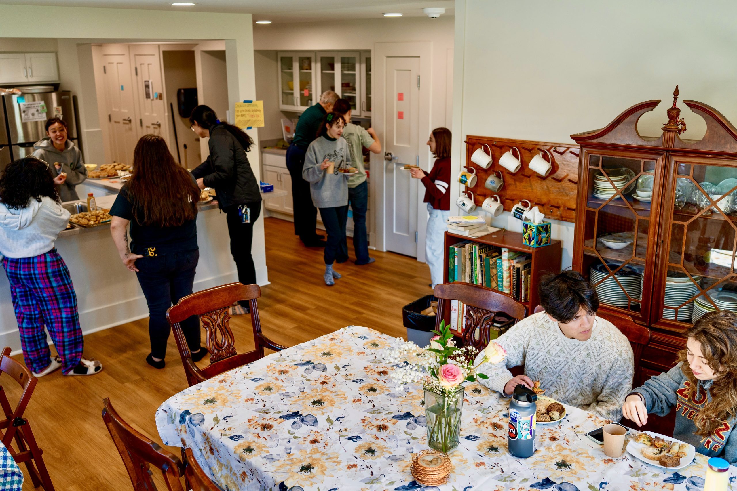 kitchen and dining room with students