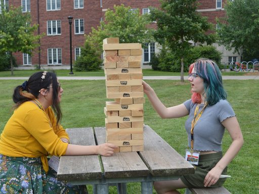 Two students play Jenga