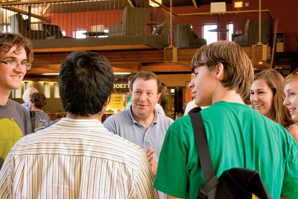 President Steve Poskanzer talks with students in Sayles-Hill