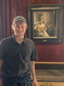 2019 David C. Donelson Fellowship recipient Hugo Caplow with a painting by Johannes Vermeer