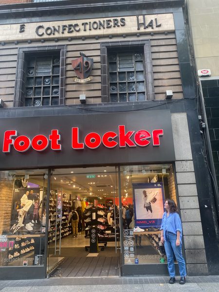 Hannah in front of Foot Locker