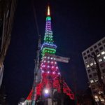 Tokyo Tower lit up with lights at night