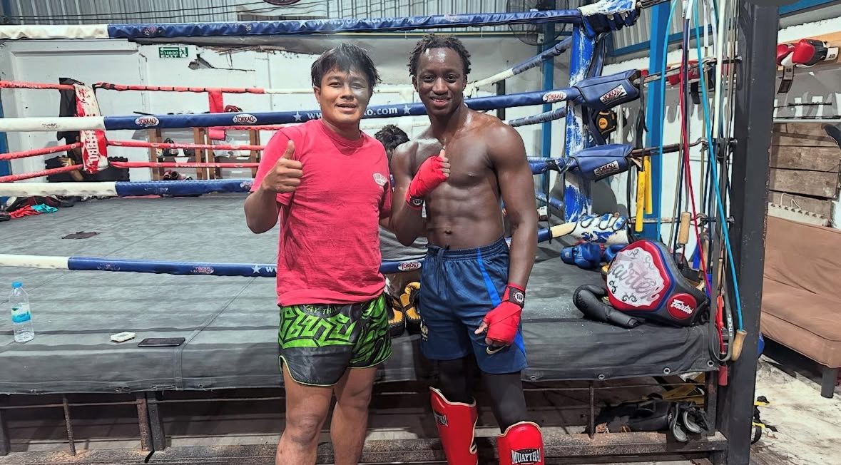 Amadao and fighter in gym
