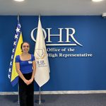 Lejla in front of European flags