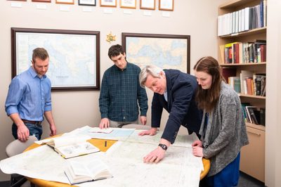 Students and faculty doing Greek research