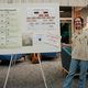 Student with their poster
