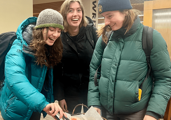Students gather at the Writing center for donuts!
