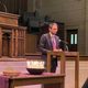 Rev. Schuyler Vogel, College Chaplain speaking at National Coming Out Day Service