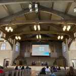 Students sitting in the Chapel listening to the Hamantaschen vs Latke debate