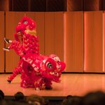 Red lion dancer standing up