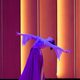 Student in purple flowing dress with arms outstretched to the side and head leaning back