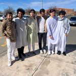 six students posing for a picture on Eid