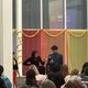 Two students speaking at Holi/Purim