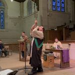 Archdruid of the Oakdale Grove blows a long horn at the Imbolc Service