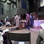 A group of druids gathered around the altar at the Imbolc service
