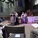 4 druids gathered around an altar at Imbolc service