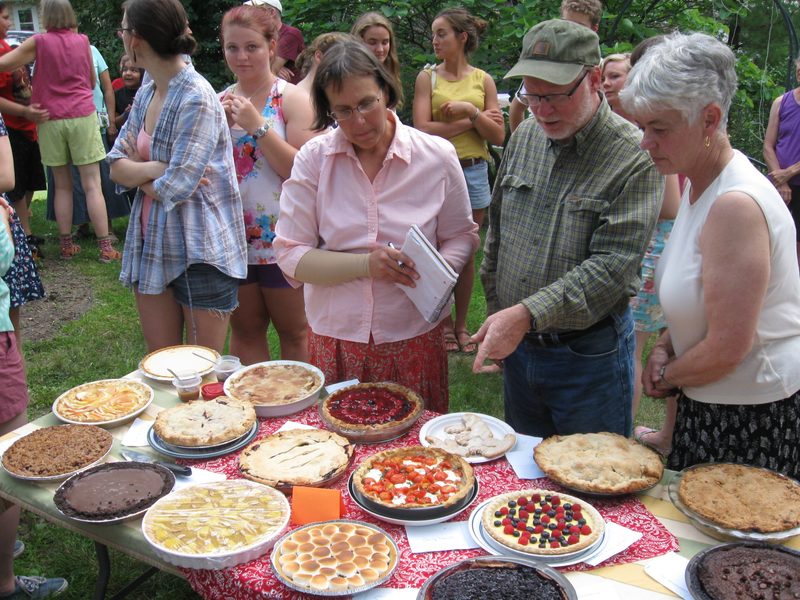 The judges check the pies for aesthetics.