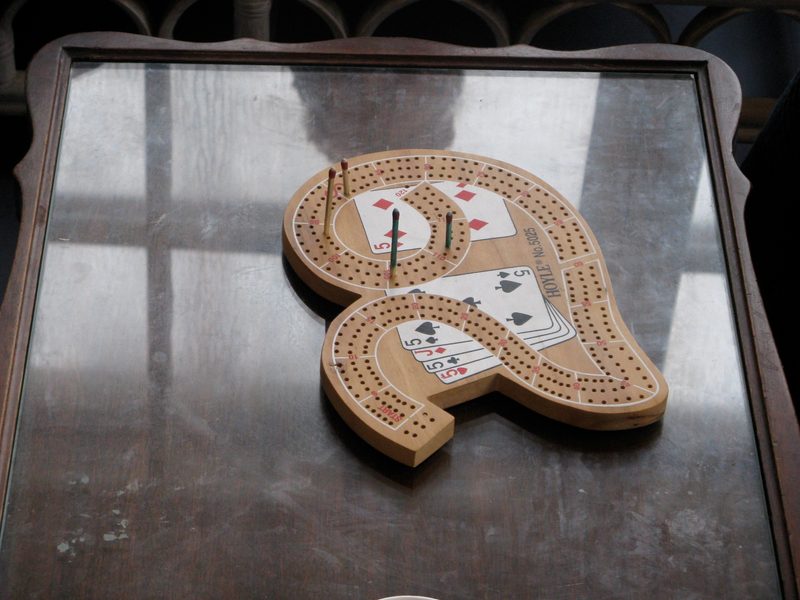 The cribbage board.