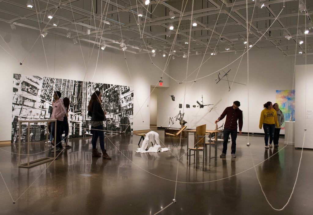 The senior art show installed in the Perlman Gallery.