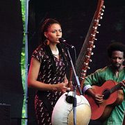 Image of West African musician Sona Jobarteh performing.