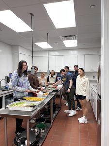 Students enjoying the catered food during the 2025 Karaoke Night