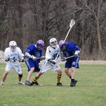 Members of club lacrosse playing in a game
