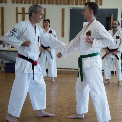 Kyoshi Mackay practices yakusoku kumite with Sempai David Huyck