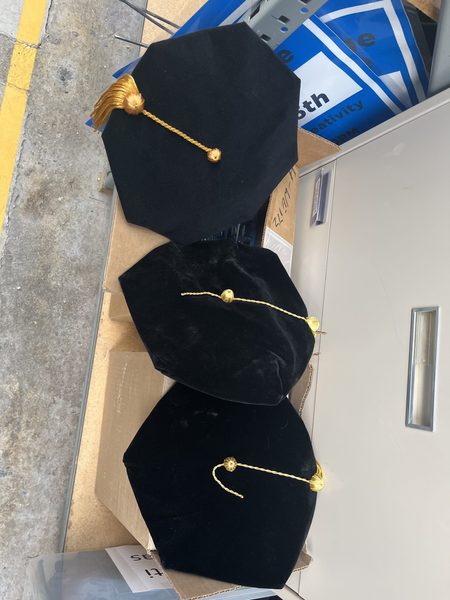Black and gold tams
